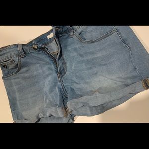 KanCan denim mid rise shorts.